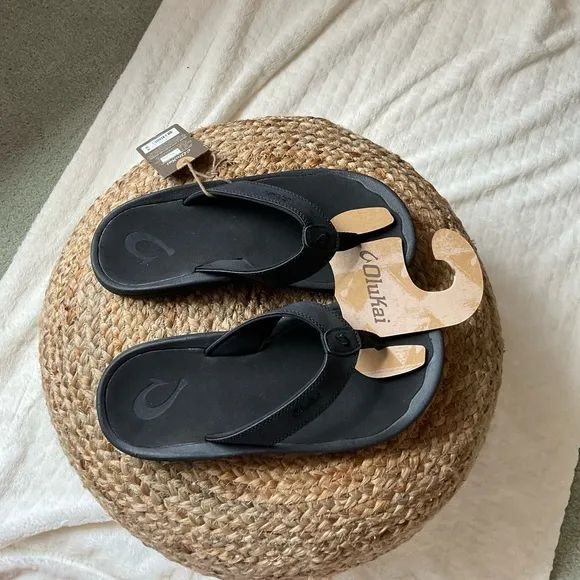 Olukai Black Flip Flops