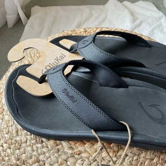 Olukai Black Flip Flops
