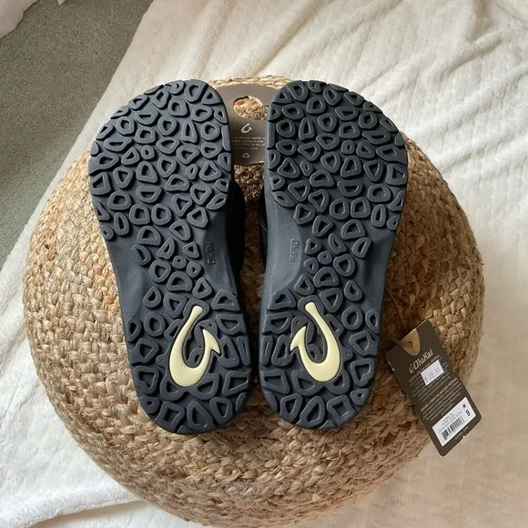 Olukai Black Flip Flops