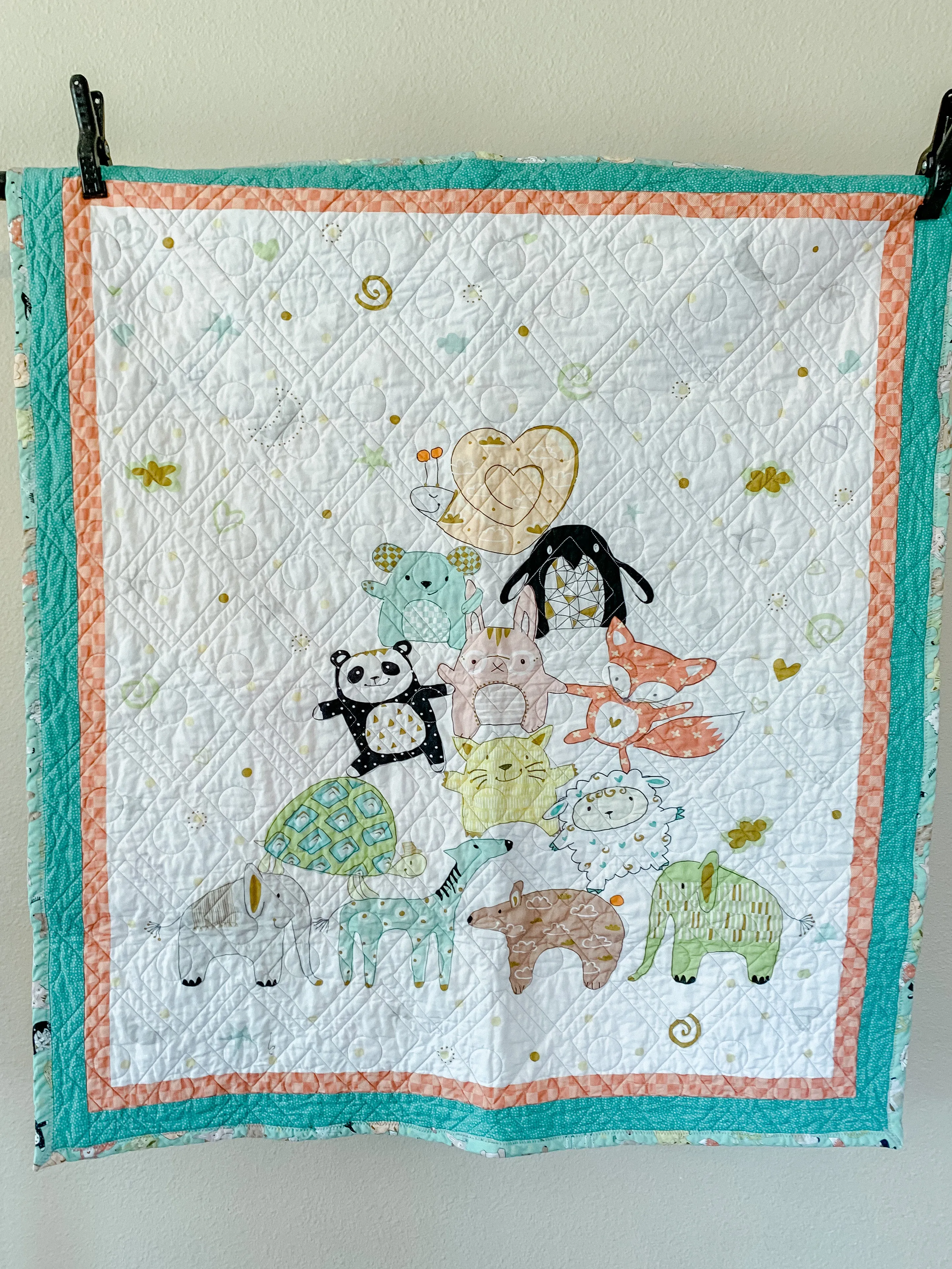 Playful Teal and Orange Animal Pyramid: Handmade Baby Quilt